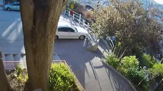 Raw video: car flips in San Francisco crash