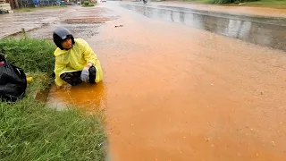 Draining A Massive Flooded Street Again During A Heavy Rain