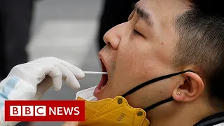 Beijing begins mass Covid testing after cases spike - BBC News