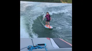 Kids wake surfing without the rope.