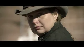 The preacher finally arrives as the people of La Belle bury one of their fallen | Godless-Netflix
