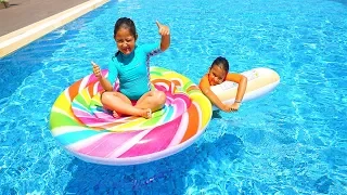 Öykü and Masal play in inflatable giant candy - fun pool