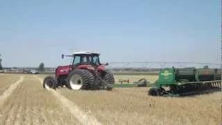 Buhler Versatile 2160 Tractor planting soybeans into wheat stubble