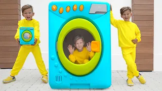 Senya and Mommy playing with magical toy washing machine