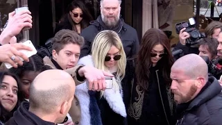 EXCLUSIVE:  Gigi Hadid and Kendall Jenner swarmed by a group of fans in Paris !