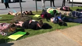 Demonstrators lay on ground to honor George Floyd