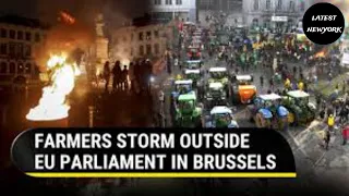 farmers storm outside eu parliament in Brussels!