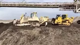 Caterpillar D9T Dozer Working With Komatsu D275AX And Cat D7R