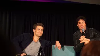 Ian and Paul discussing a funny scene in the Camaro on the set of The Vampire Diaries