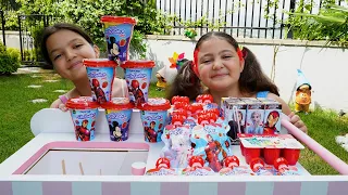 Masal and Öykü are making ice cream from Danino yogurts and playing shopping with Hüpper Milkshake