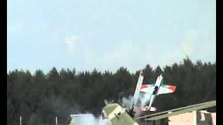 Acrobatics by unknown plane. Aviashow in Monino, Russia, 2005.