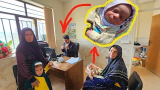 Akram takes her baby to be checked out by doctor