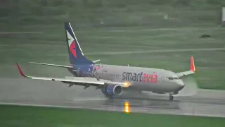 Rain in Sochi. The planes splash in reverse. Airport work. Four landings and one takeoff.