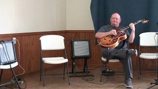 Paul Moseley playing a Heritage Golden Eagle through a Cube 40 Amp with special effects