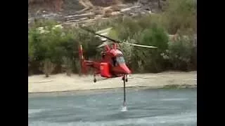 Station Fire: A KMAX Heavylift Helicopter dipping near Glendale, CA