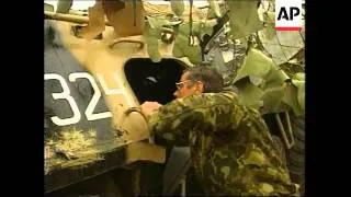 KOSOVO: PRISTINA: RUSSIAN SOLDIERS SECURE AIRPORT (V)