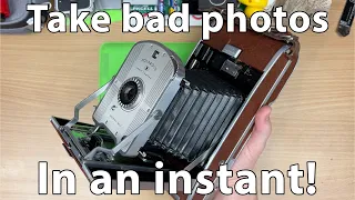 Super old Polaroid cameras.