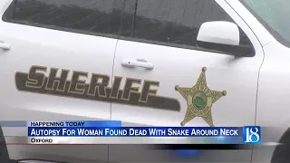 Sheriff finds woman dead with snake around her neck