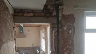 Removing and replacing wooden lintel with concrete lintel