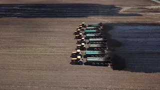 8 Fastracs Spreading Manure