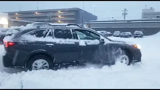 2020 Outback Touring in deep snow on stock all season tires.