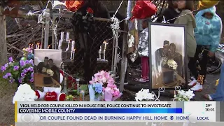 Vigil held for couple found dead in burned Happy Hill home