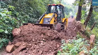 Clearing Narrow Hilly Road Dirt with JCB Backhoe