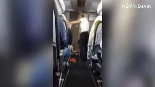 Passenger kicking and screaming on plane