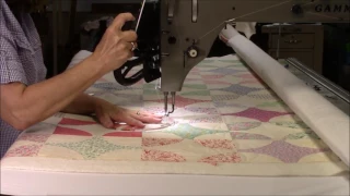 Quilting the Snowball Quilt