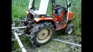 Мини трактор KUBOTA ASTE A-17 полив картофеля.