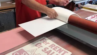 Applying pre-mask vinyl with a roll laminator