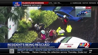 Orange County residents seen being rescued from floodwaters caused by Ian