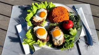 Cooking beef steak on coals and  bulgur pilaf - Outdoor Cooking