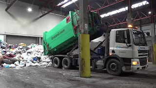 Emptying Gradeall Hook Lift Portable Waste Compactor