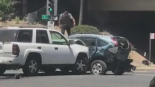 Man repeatedly rams SUV, jumps on roof in bizarre road rage incident