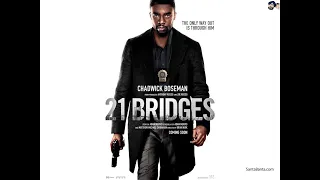 َA scene from 21 Bridges with RIP Chadwick Boseman