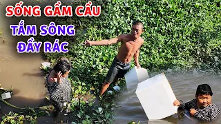 Không thể tin cha và con gái sống gầm cầu tắm giặt dưới sông đầy rác