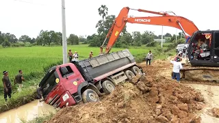 Incredible Recovery Full soil loading Hyundai Truck fail into Canal by Hitachi Excavator and Crane