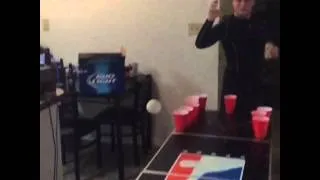 Slow-mo, beer pong game winning shot.