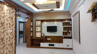 Ravi MyHome Interiors 2 BHK Interiors,Wardrobe with Tv Unit Design.