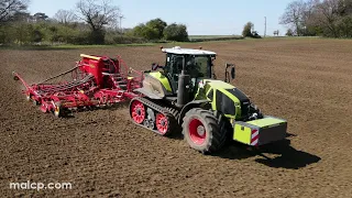 4k Claas Axion 960 Terra Trac tractor drilling spring barley with a Väderstad Rapid A 800S drill.