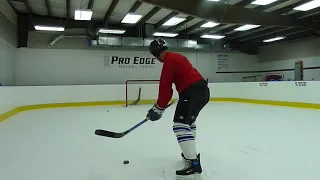 Wood vs Carbon Hockey sticks slap shot test by Ron Winter