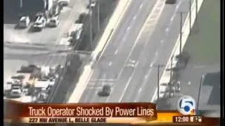 Truck operator shocked by power lines