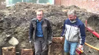 View The Moment A 1,000-Year-Old Coffin Is Opened