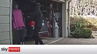 Elderly couple held at gunpoint in their garage