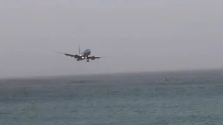 SCARY: Westjet Boeing 737 almost crashes into water @ St. Maarten