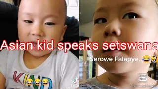 Adorable Asian child speaks setswana