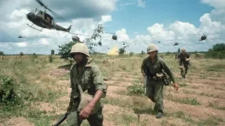 Long cool woman in a black dress - Vietnam War