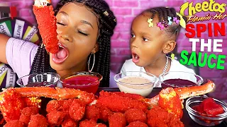 HOT CHEETOS KING CRAB SEAFOOD BOIL "SPIN THE WHEEL" CHALLENGE SEAFOOD MUKBANG 먹방 QUEEN BEAST & LAYLA