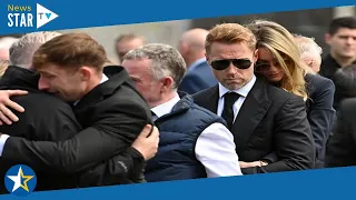 Heartbroken Ronan Keating comforted by wife Storm at brother’s funeral